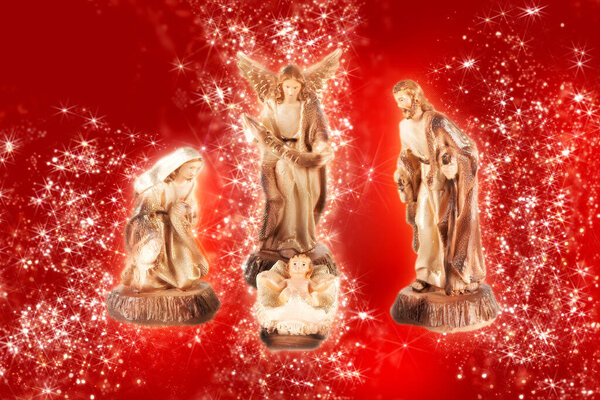 Nativity scene. Traditional Christmas scene with red background.