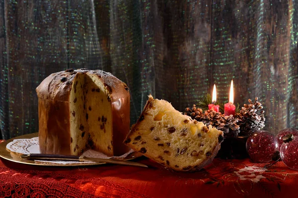 Christmas Panettone Sliced Slice Arranged Golden Plate Lighted Candles Decorations 免版税图库照片