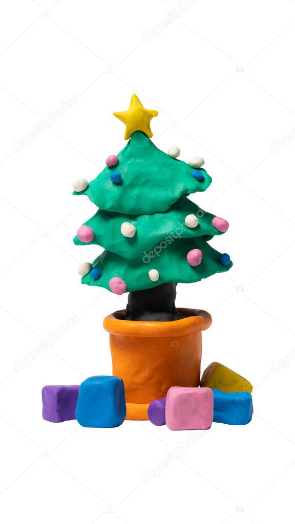 Background and textured made from plasticine. Christmas tree in a pot with a gift box placed on the floor to decorate the event. Isolated white background with clipping path.