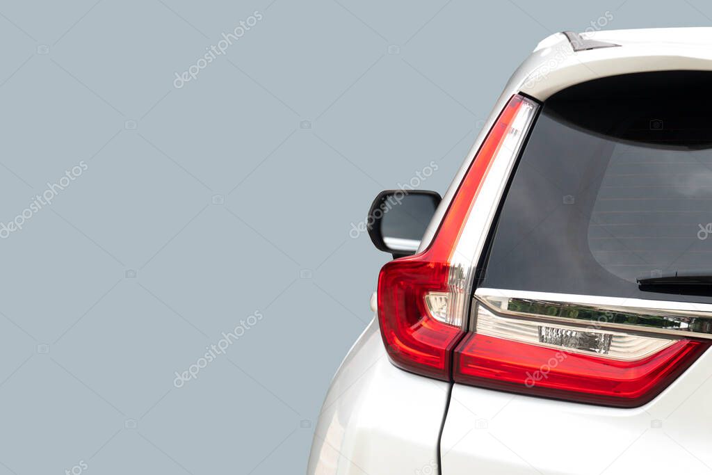 Rear side of whie car with tail lamp. and isolated background gray color. for Transport background and textured.