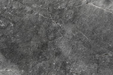 Görünüm taşının üstündeki arka plan ve dokulu yüzey. Koyu lekeler ve doğal desenler.