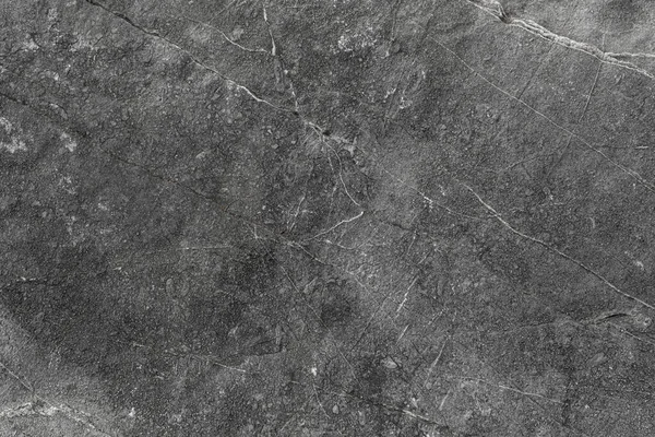 Görünüm taşının üstündeki arka plan ve dokulu yüzey. Koyu lekeler ve doğal desenler.
