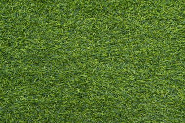 Yeşil yapay çimlerin üst görüntüsü. arkaplan ve desenli.