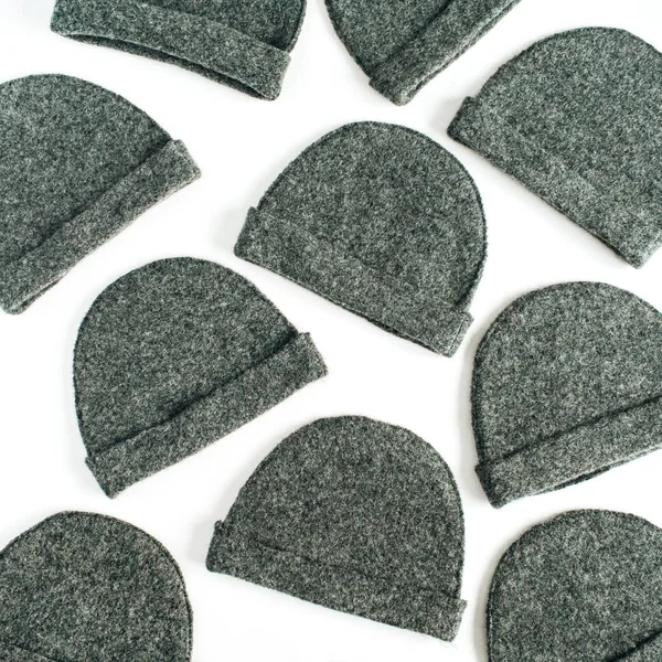 Grey Craft Warm Winter Bonnets White Background Flat Lay Top — Stock Photo, Image