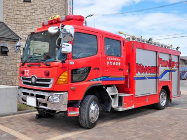 Hokkaido,Japan - July 10, 2022: A fire engine parking in front of Yoichi Fire Department in Hokkaido, Japan