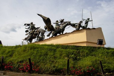 MANIZALES, COLOMBIA - MAY, 2022: Monument to the Colonizers created by the artist Luis Guillermo Vallejo with the sand bronze casting technique