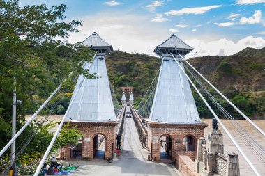 The historical Bridge of the West a a suspension bridge declared Colombian National Monument built in 1887 over the Cauca River
