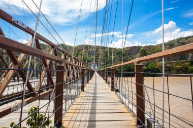 The historical Bridge of the West a a suspension bridge declared Colombian National Monument built in 1887 over the Cauca River