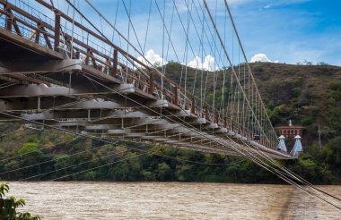 The historical Bridge of the West a a suspension bridge declared Colombian National Monument built in 1887 over the Cauca River