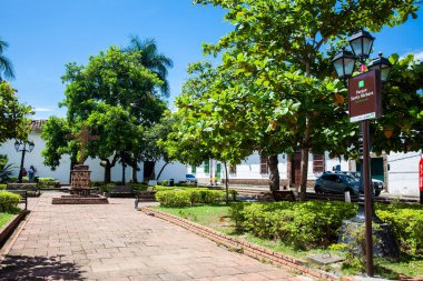 SANTA FE DE ANTIOQUIA, , COLOMBIA - NOVEMBER, 2017: Historical Santa Barbara church built in 1726 at the beautiful colonial town of Santa Fe de Antioquia in Colombia