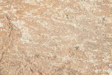 Çatlak ve dokuları olan doğal taşın alışılmadık dokusu. Doğal granit bir mineral taşıdır. Kavram - arkaplan için doku