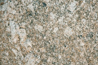 Çatlak ve dokuları olan doğal taşın alışılmadık dokusu. Doğal granit bir mineral taşıdır. Kavram - arkaplan için doku