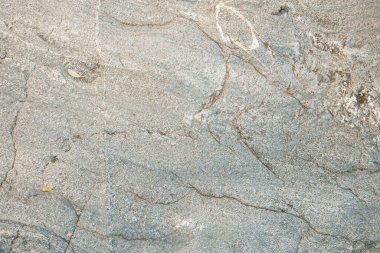 Çatlak ve dokuları olan doğal taşın alışılmadık dokusu. Doğal granit bir mineral taşıdır. Kavram - arkaplan için doku