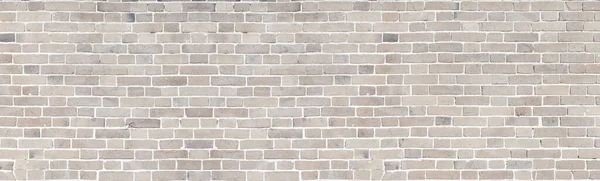 Brick wall of beige stone panorama background — ストック写真