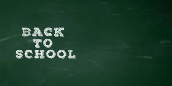 Abstract texture of chalk on green chalkboard with back to school text on it . Copy space