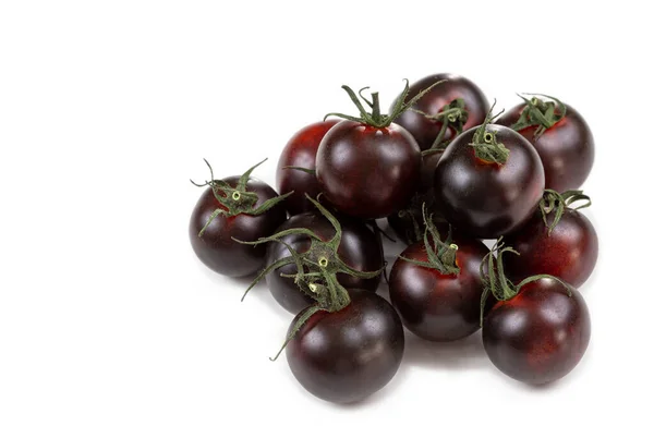 Crimea or Tondo Nero tomatoes Italian Black Cherry. Top view, clipping paths -black cherry tomatoes isolated on white background. — Stock Photo, Image