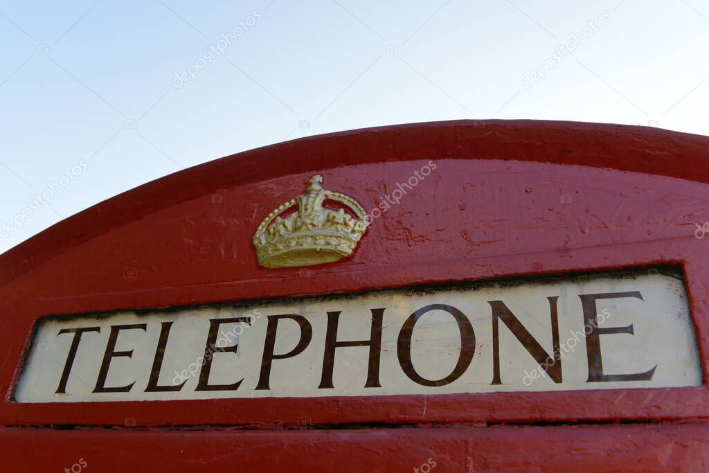 Traditional British Red Phone Box on a London Street