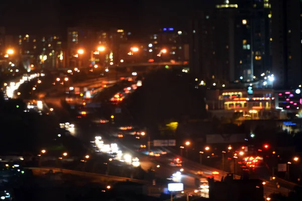 Verschwommenes Blinklicht Des Schwerverkehrs Auf Einer Stadtstraße Der Nacht Pendeln — Stockfoto