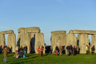 Stonehenge, UK - December 22, 2018: Revellers gather at Stonehenge to celebrate the winter solstice.