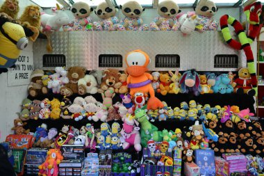 Soft toys are seen on display at the funfair game booth on March 25, 2016 in Trowbridge, UK.