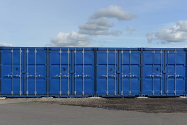 View of generic freight containers at a port