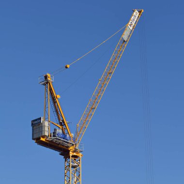 Bristol, UK - October 5, 2016: A crane works on a city centre construction site. Bristol is seeing significant redevelopment in residential, office and commerical sectors.