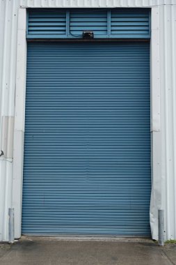 view of blue rolling door