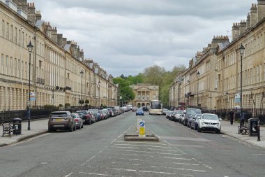 Bath, UK - May 9, 2018: View of Great Pulteney Street. The city of Bath is a famous tourist destination with around 4 million visitors a year.