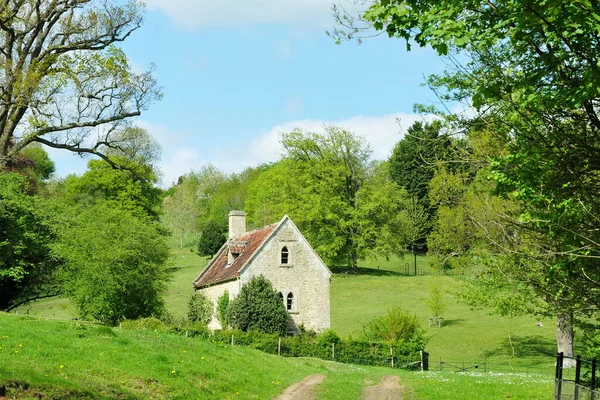 Exterior view of a traditional stone cottage house in an English town