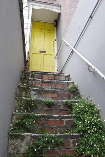 old wooden door with stairs