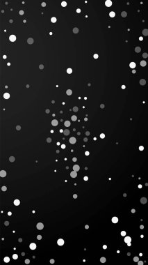 Beyaz noktalar Noel arkaplanı. İnce uçan kar taneleri ve siyah arka plandaki yıldızlar. Canlı canlı gümüş kar tanesi şablonu. Dikey illüstrasyon çekici.