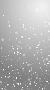 Sihirli yıldızlar rastgele Noel arkaplanı. İnce uçan kar taneleri ve gri arkaplanda yıldızlar. Temyize giden Gümüş Kar Tanesi şablonu. Yaratıcı dikey illüstrasyon.