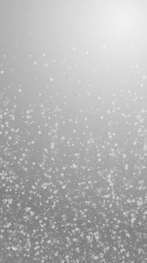 Güzel kar yağışı Noel arkaplanı. İnce uçan kar taneleri ve gri arkaplanda yıldızlar. İnanılmaz kış gümüşü kar taneleri şablonu örtüyor. Bunaltıcı dikey illüstrasyon.