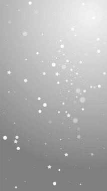 Sihirli yıldızlar rastgele Noel arkaplanı. İnce uçan kar taneleri ve gri arkaplanda yıldızlar. Tatlı kış gümüşü kar tanesi şablonu örtüyor. Bunaltıcı dikey illüstrasyon.