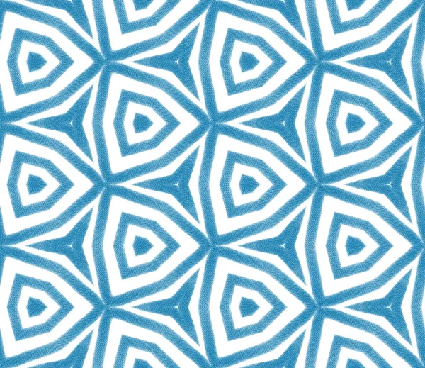 Geometric seamless pattern. Blue symmetrical kaleidoscope background. Hand drawn geometric seamless design. Textile ready great print, swimwear fabric, wallpaper, wrapping.