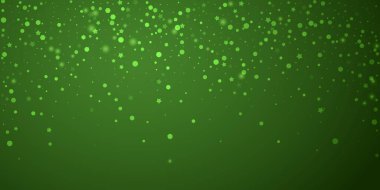 Sihirli kar yağışı arkaplanı. İnce uçan kar taneleri ve yeşil arka plandaki yıldızlar. Sihirli yağan kar tatili manzarası. Geniş vektör illüstrasyonu.