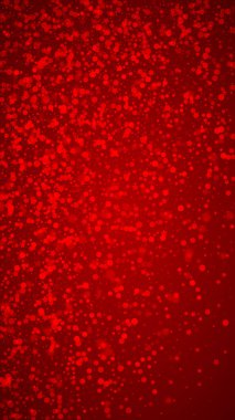 Sihirli kar yağışı arkaplanı. İnce uçan kar taneleri ve kırmızı arka plandaki yıldızlar. Sihirli yağan kar tatili manzarası. Dikey vektör illüstrasyonu.