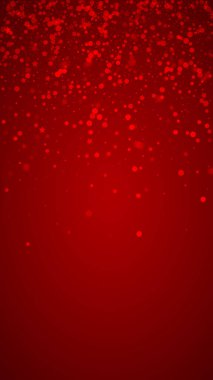 Karlı bir Noel geçmişi var. İnce uçan kar taneleri ve kırmızı arka plandaki yıldızlar. Narin, tatlı, karlı bir Noel. Dikey vektör illüstrasyonu.