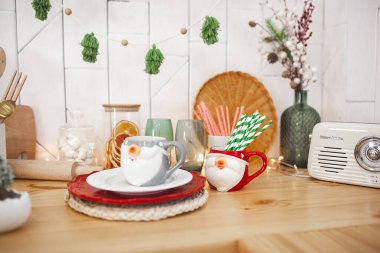 Christmas decoration on the kitchen. Kitchen interior holidays. New Year design.