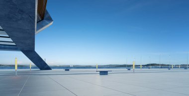 Perspective view of empty concrete floor and modern rooftop building. 3d rendering