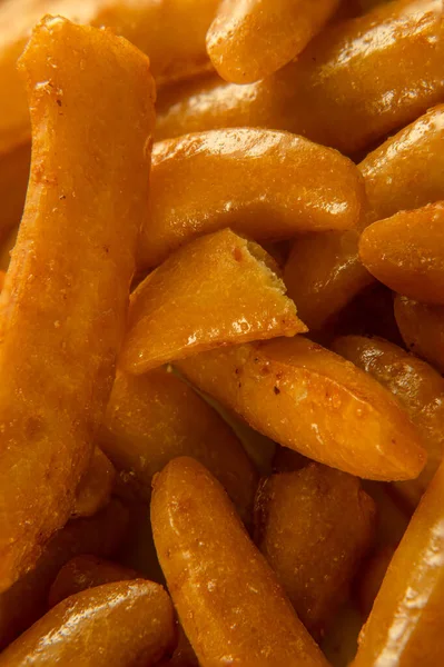 Geleneksel Japon pirinç krakerlerine yakın Kaki No Tane veya Kaki-pi. Makro desenli yemek geçmişi. Yüksek kalite fotoğraf