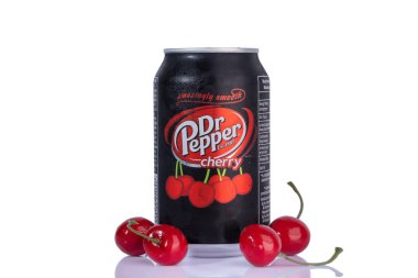 KYIV, UKRAINE - August 7, 2022 drink doctor pepper with cherry on a white background. High quality photo