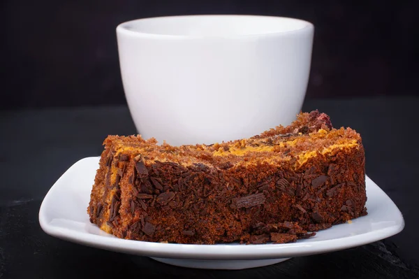 cake with bluetooth a for coffee on a dark stone background. High quality photo