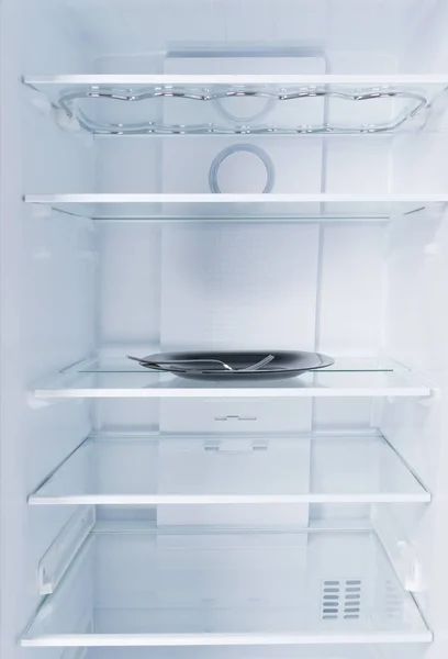 냉장고의 뒷면에는 포크가 — 스톡 사진
