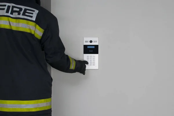 Close Intercom Button Fireman Hand Presses Place Inscription — Stock Photo, Image
