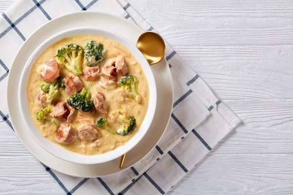 Hearty Broccoli Cheddar Cheese Sausage Soup White Bowl Wooden Table — Stock Photo, Image