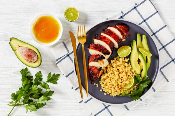 Grilled Chicken Breast Israel Couscous Ptitim Fresh Avocado Lime Plate — Stock Photo, Image