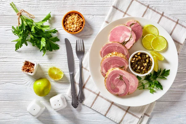 Italian Garlic Herb Stuffed Rolled Pork Tenderloin Slices White Plate — стоковое фото