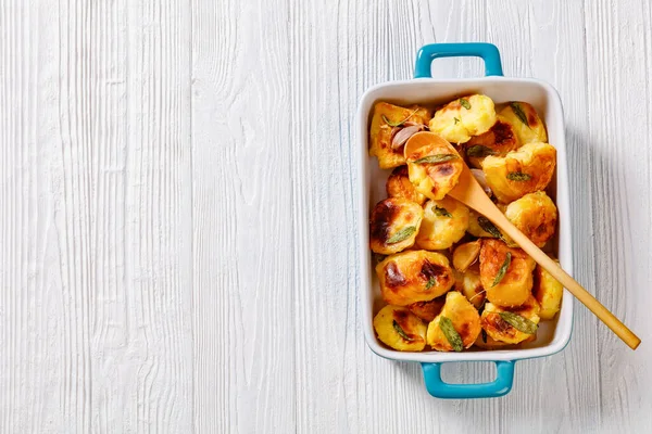 Crispy Roasted Squashed Potatoes Caramelised Garlic Sage Leaves Baking Dish — Stock Photo, Image