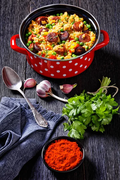 Smoked Sausages Rice Bell Pepper Onion Green Peas Red Pot — Stok fotoğraf